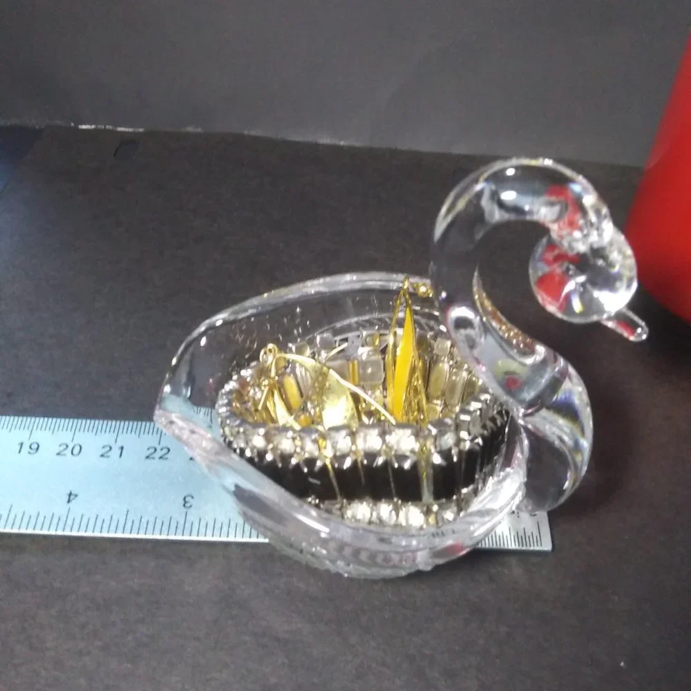 lovely clear glass swan shaped trinket dish with cut design on sides